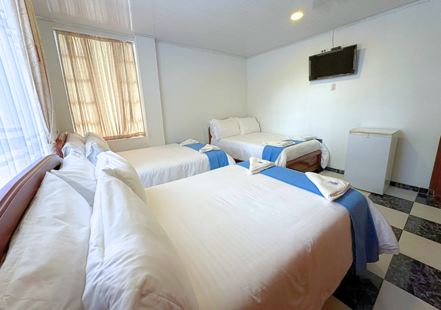 Habitación Triple- Hotel 103